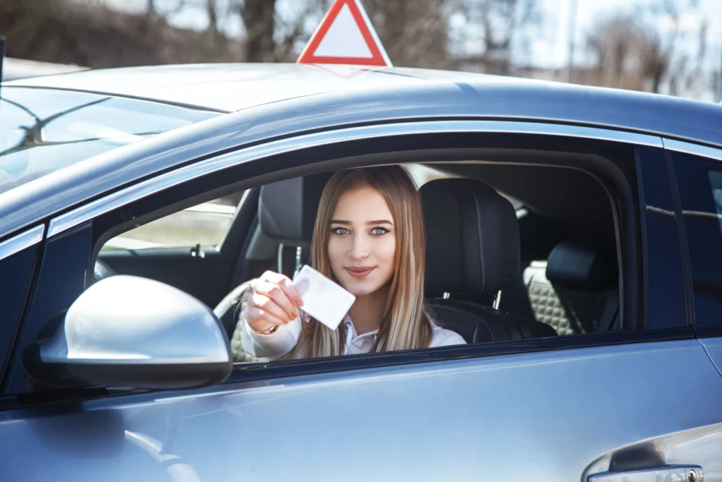 joyful-girl-driving-a-training-car-with-a-drivers-2025-01-07-23-11-32-utc_(1)